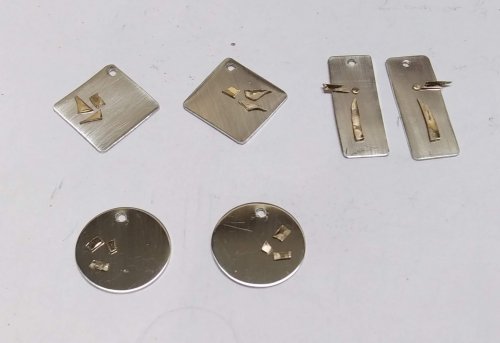 Judy Larson's Silver and Gold Earrings - , Contemporary Wire Jewelry, Butane Torch, Soldering, Solder, Leave space on each silver piece for background texturing.